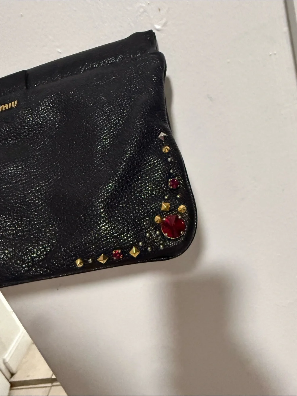 Miu Miu Black Leather Studded Clutch with Red Gem Accents